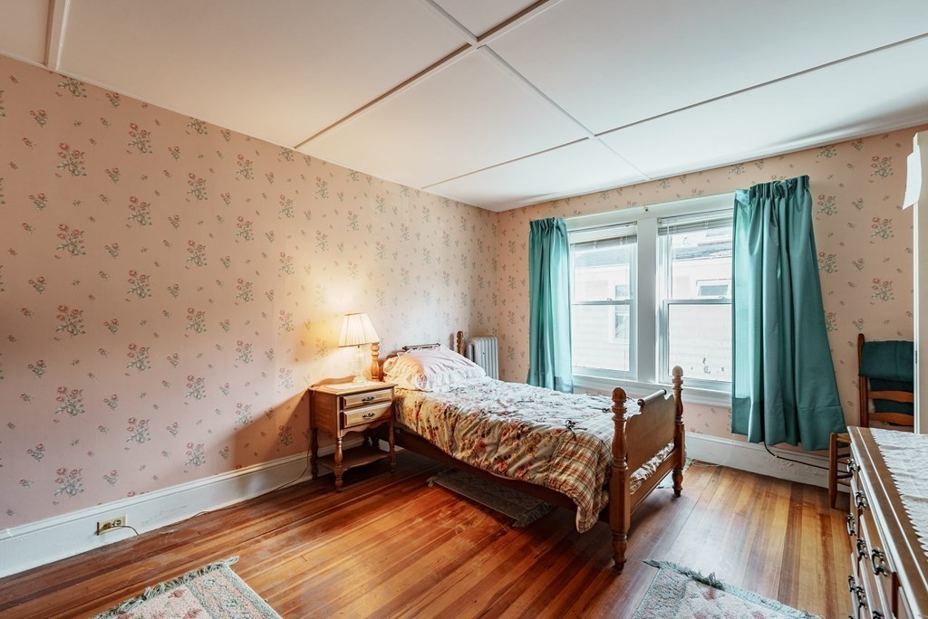 73 Sunapee Street Springfield, MA 01108 - Photo 24 of 40 a bedroom with a bed and a large window