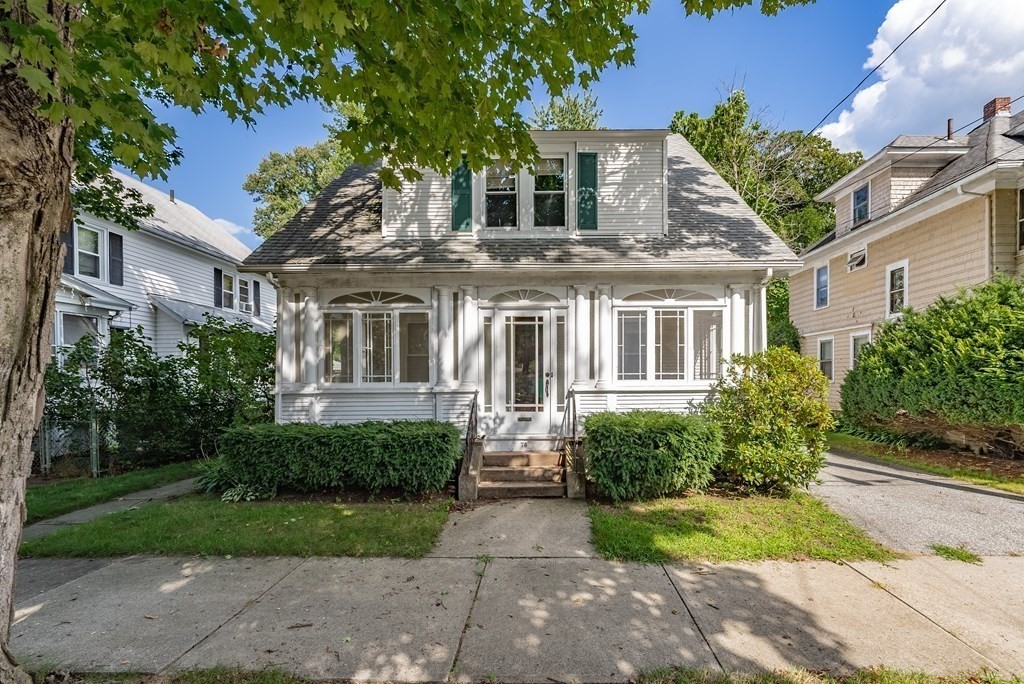 73 Sunapee Street Springfield, MA 01108 - Photo 3 of 40 a front view of house with yard and green space