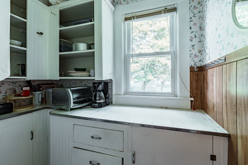 73 Sunapee Street Springfield, MA 01108 - Photo 33 of 40 a kitchen with a refrigerator and a sink