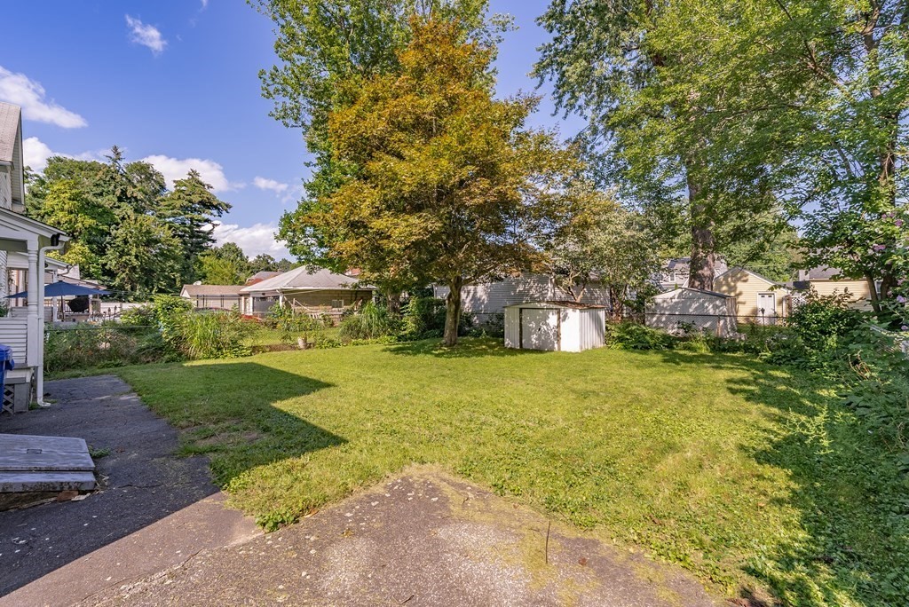73 Sunapee Street Springfield, MA 01108 - Photo 38 of 40 a front view of a house with a yard