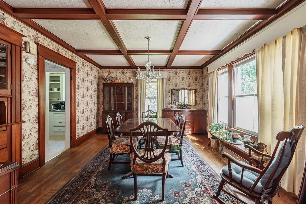 73 Sunapee Street Springfield, MA 01108 - Photo 8 of 40 a view of a dining room with furniture window and wooden floor