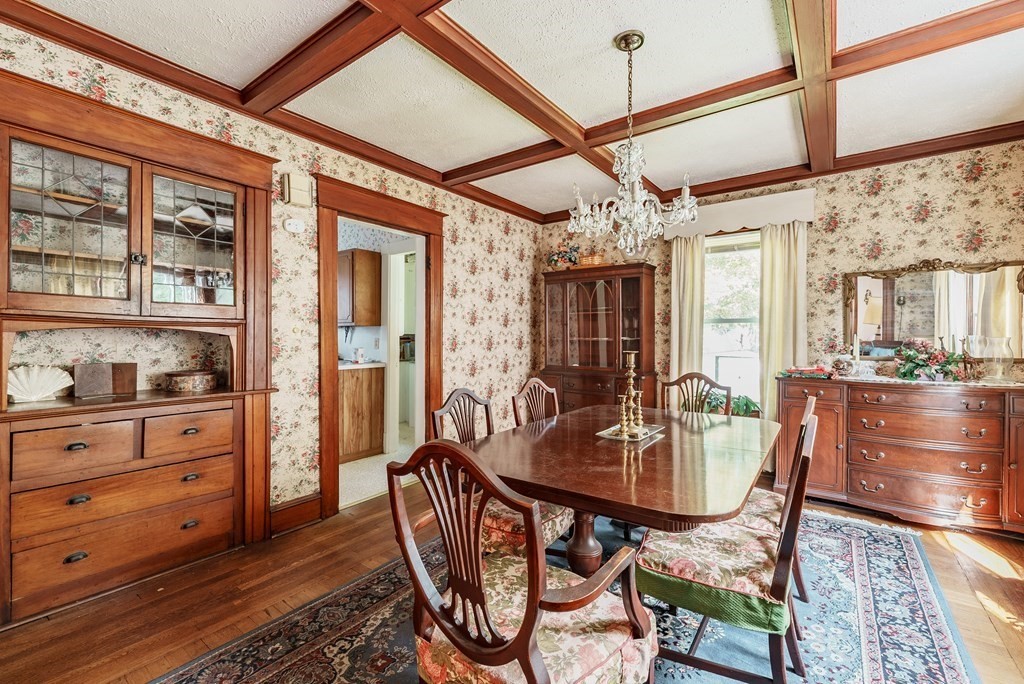 73 Sunapee Street Springfield, MA 01108 - Photo 9 of 40 a view of a dining room with furniture window and wooden floor