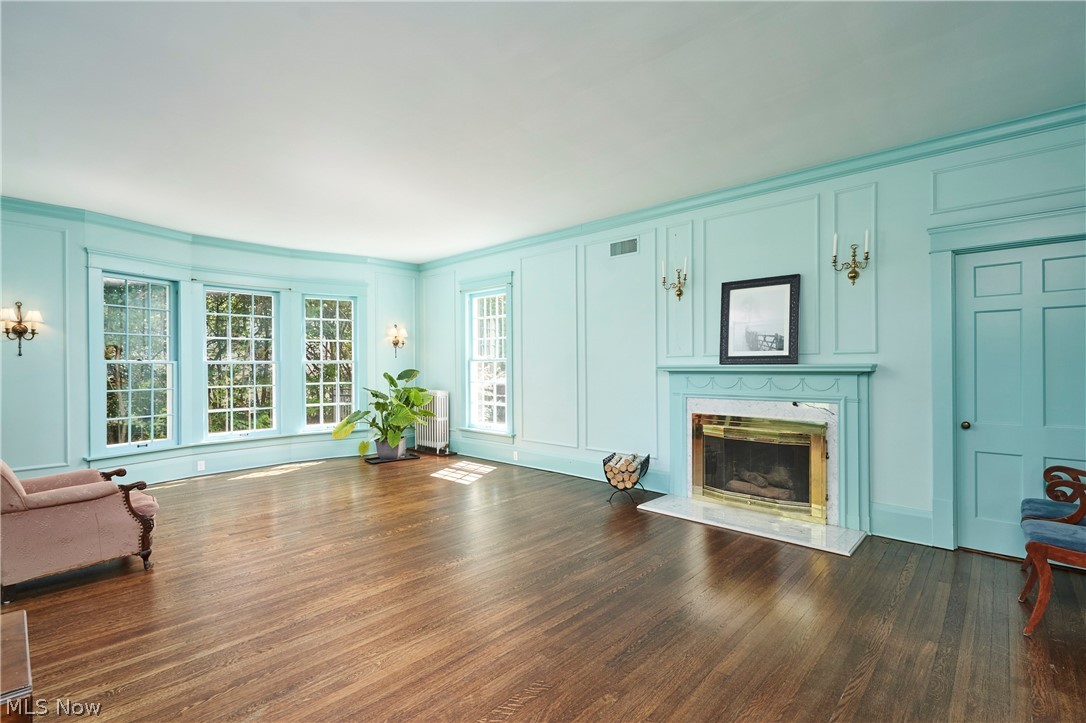 874 Merriman Road Akron, OH 44303 - Photo 16 of 50 Elegant living room with gas FP with marble surround