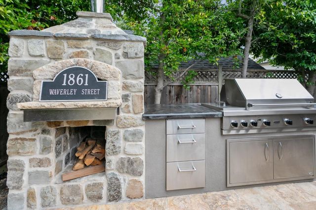 swimming pool view with a seating space