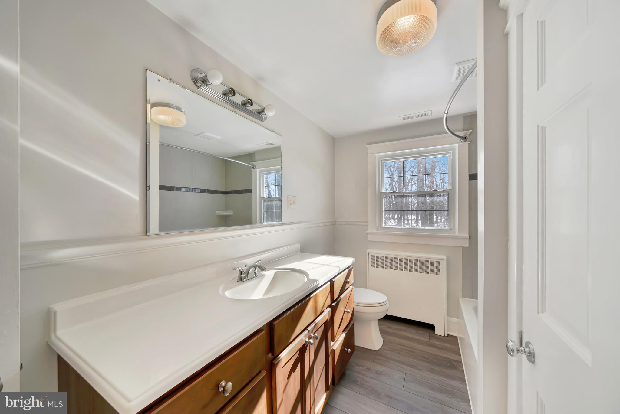 2675 Jolly Acres Road White Hall, MD 21161 - Photo 26 of 50 a bathroom with a sink and a mirror