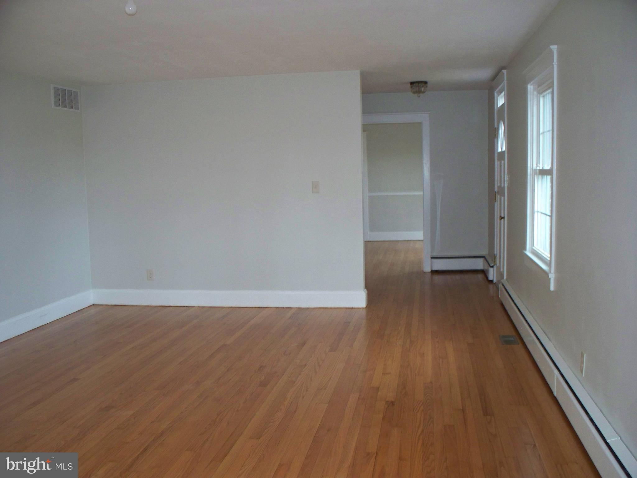 2675 Jolly Acres Road White Hall, MD 21161 - Photo 4 of 20 Entrance Foyer & Living Room