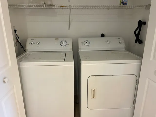a utility room with dryer and washer