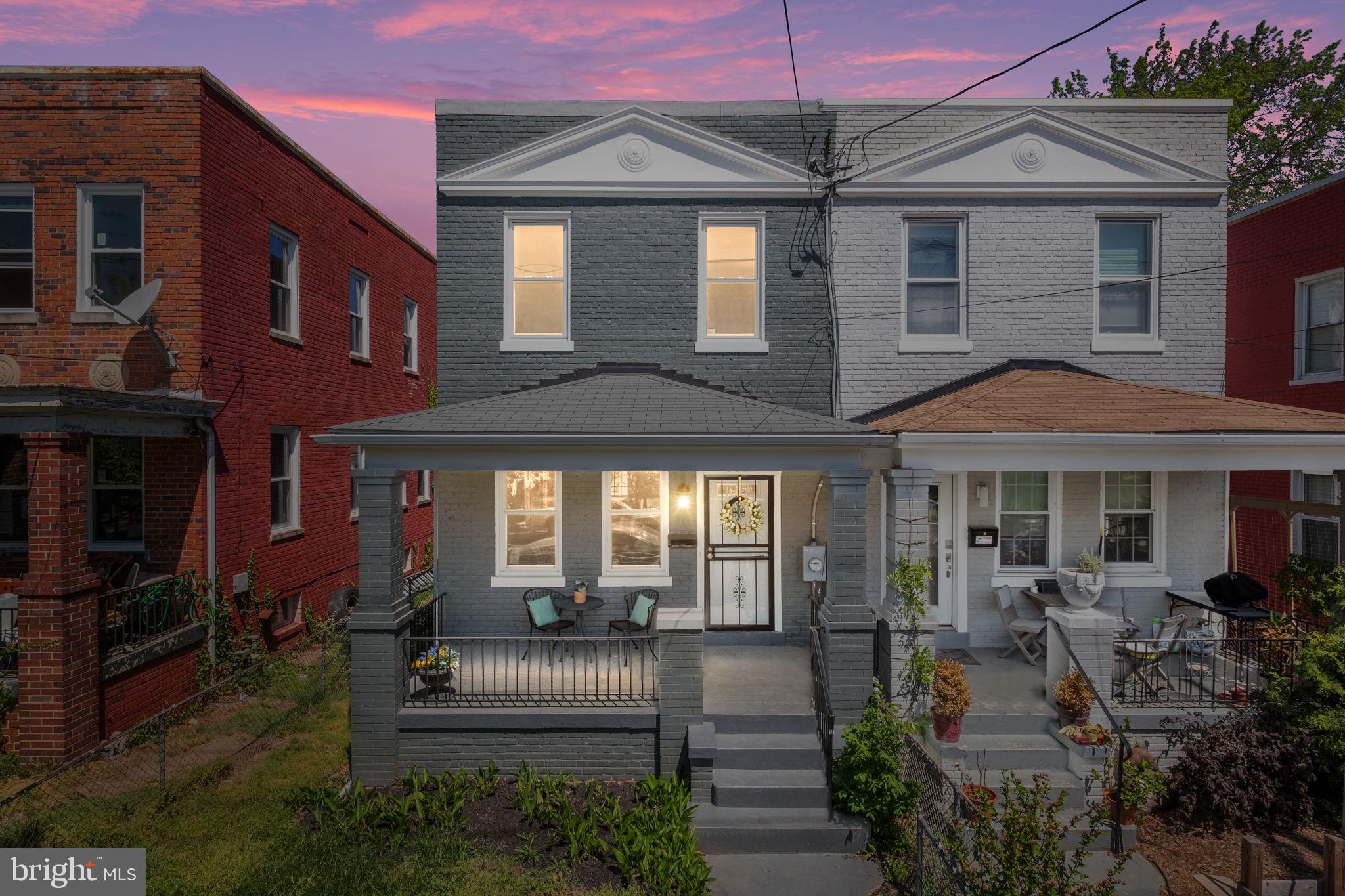 a front view of a house with a porch