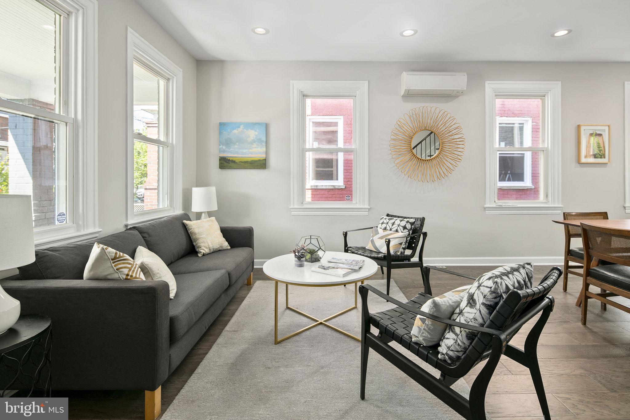 713 Rittenhouse Street Northwest Washington, DC 20011 - Photo 13 of 35 a living room with furniture and a potted plant