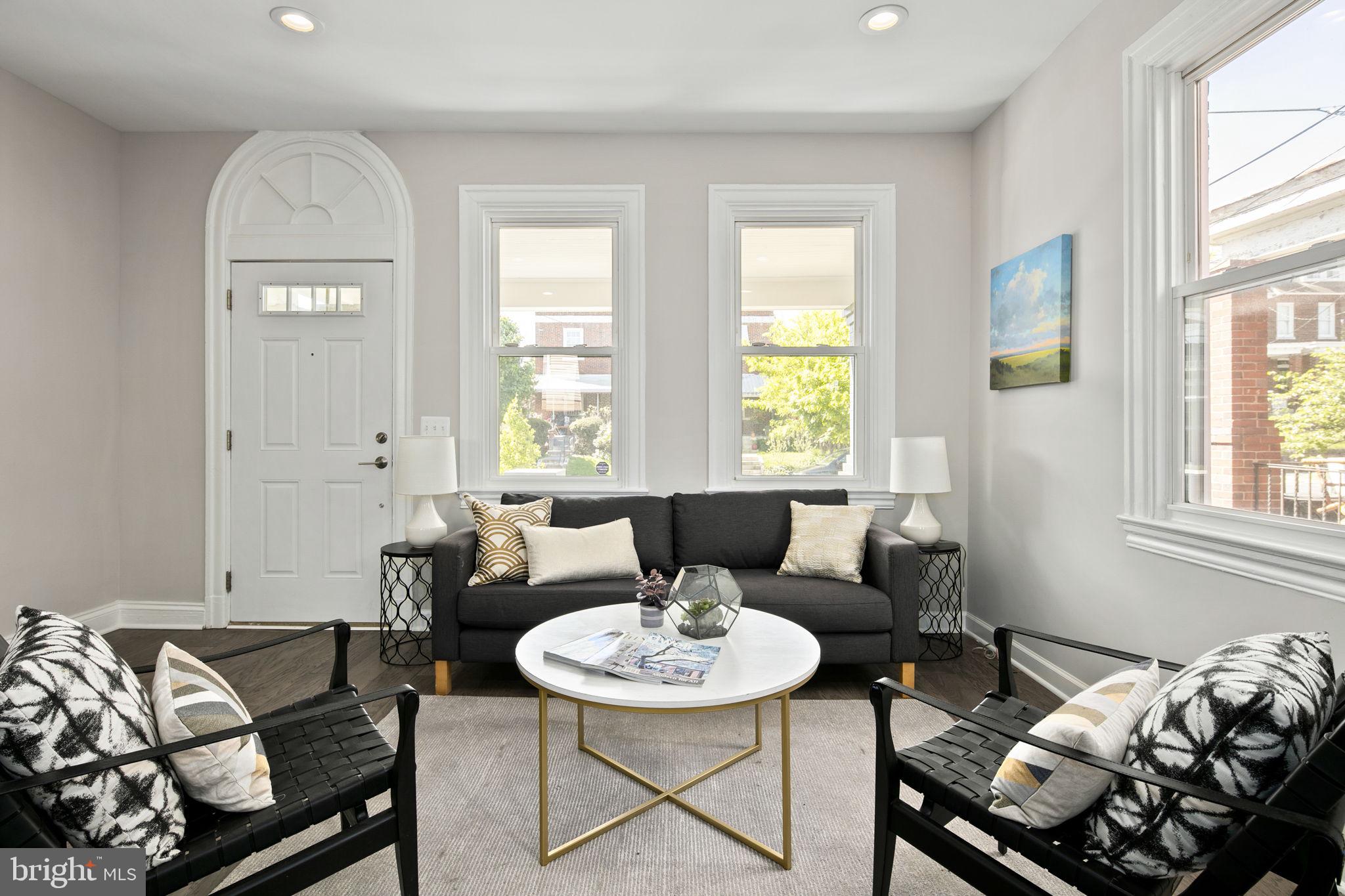 713 Rittenhouse Street Northwest Washington, DC 20011 - Photo 14 of 35 a living room with furniture and a window