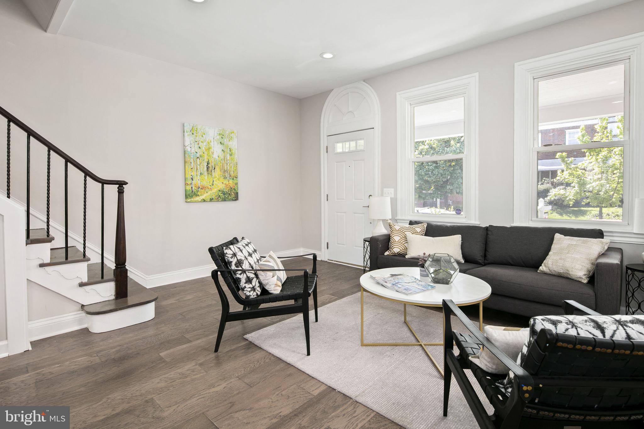 713 Rittenhouse Street Northwest Washington, DC 20011 - Photo 16 of 35 a living room with furniture and a window