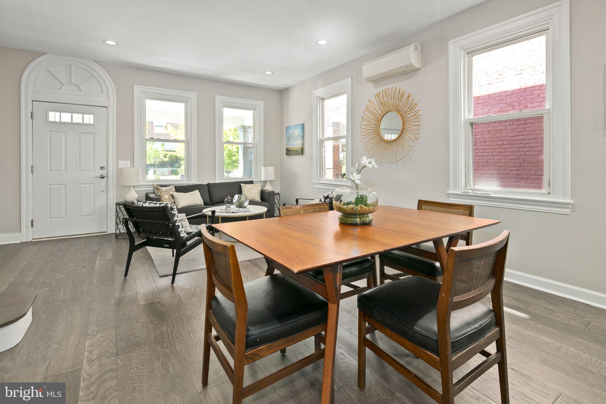 713 Rittenhouse Street Northwest Washington, DC 20011 - Photo 17 of 35 a view of a dining room with furniture and chandelier