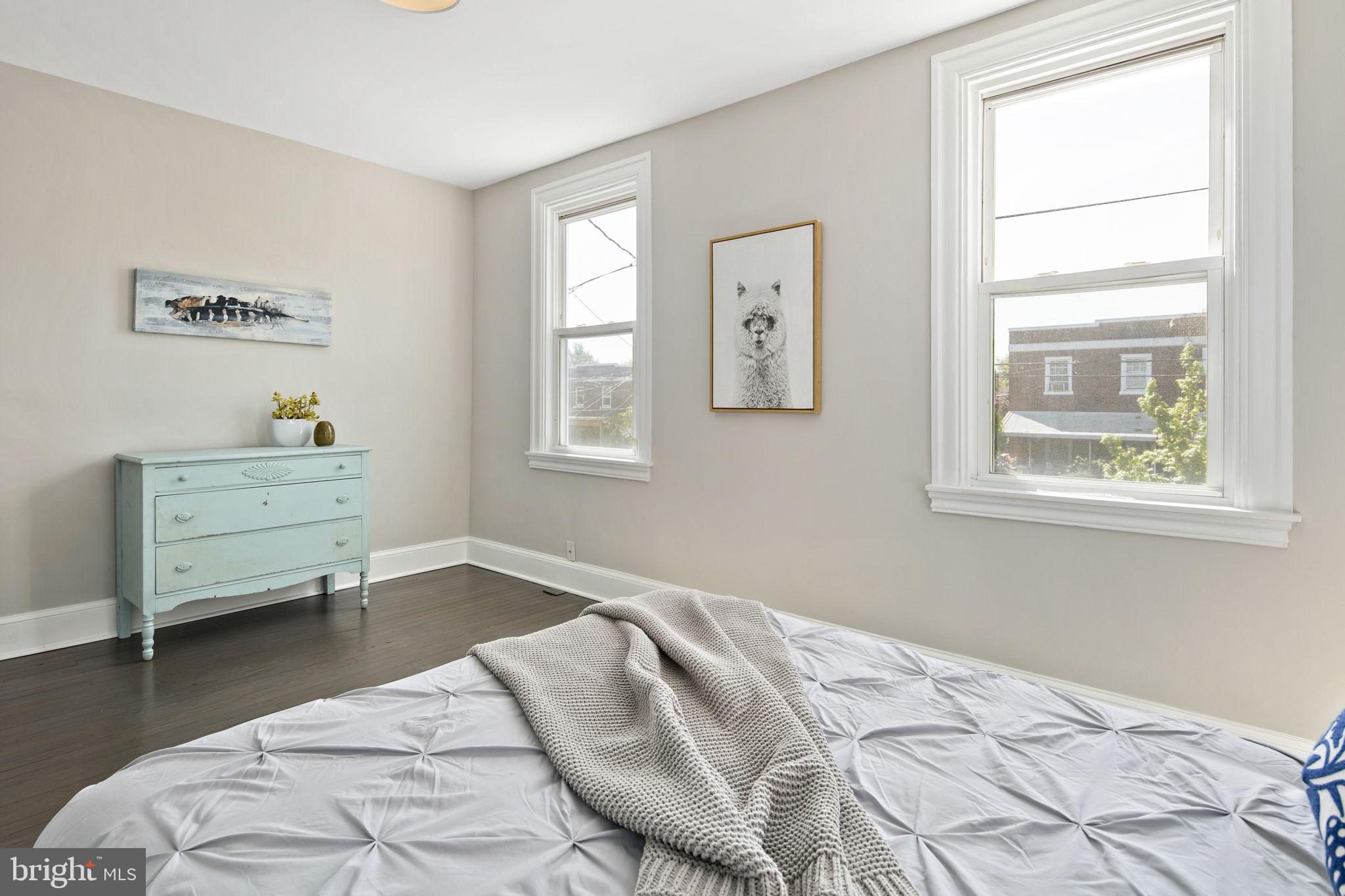 713 Rittenhouse Street Northwest Washington, DC 20011 - Photo 24 of 35 a bedroom with a bed and a window