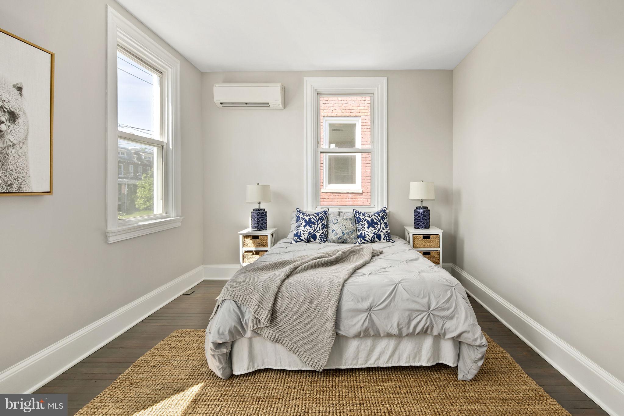 713 Rittenhouse Street Northwest Washington, DC 20011 - Photo 25 of 35 a bedroom with a bed and a window