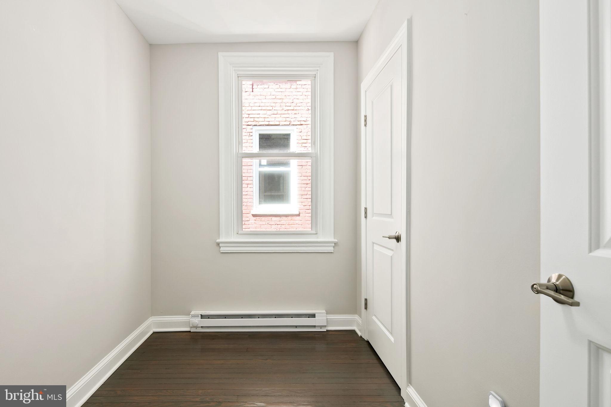 713 Rittenhouse Street Northwest Washington, DC 20011 - Photo 30 of 35 a view of an empty room with a window