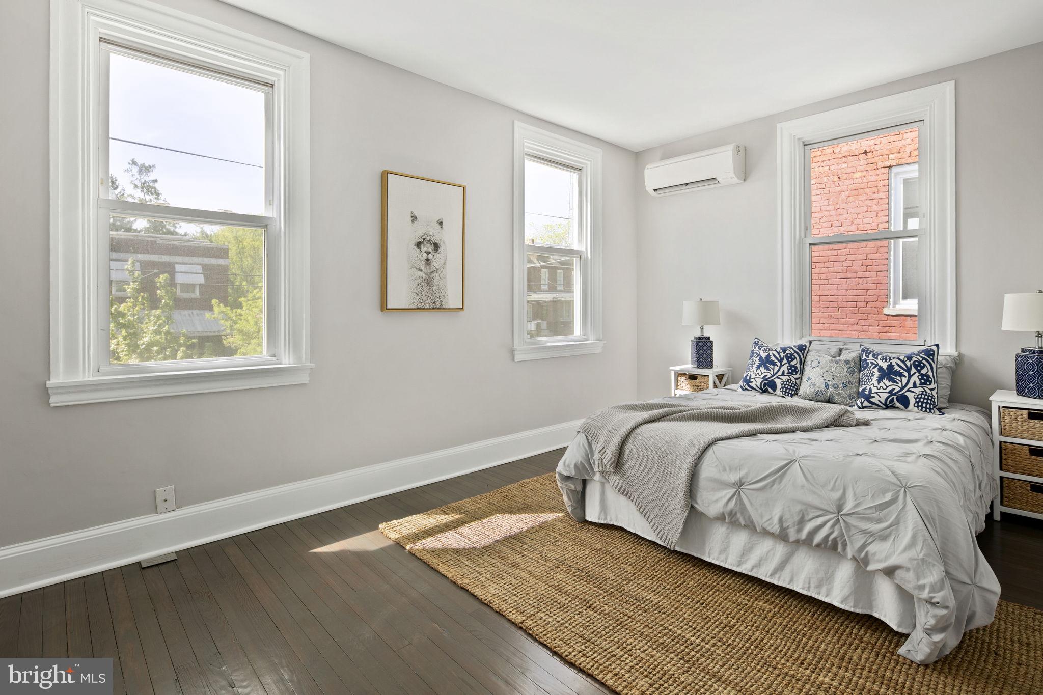713 Rittenhouse Street Northwest Washington, DC 20011 - Photo 6 of 35 a bedroom with a bed and a window