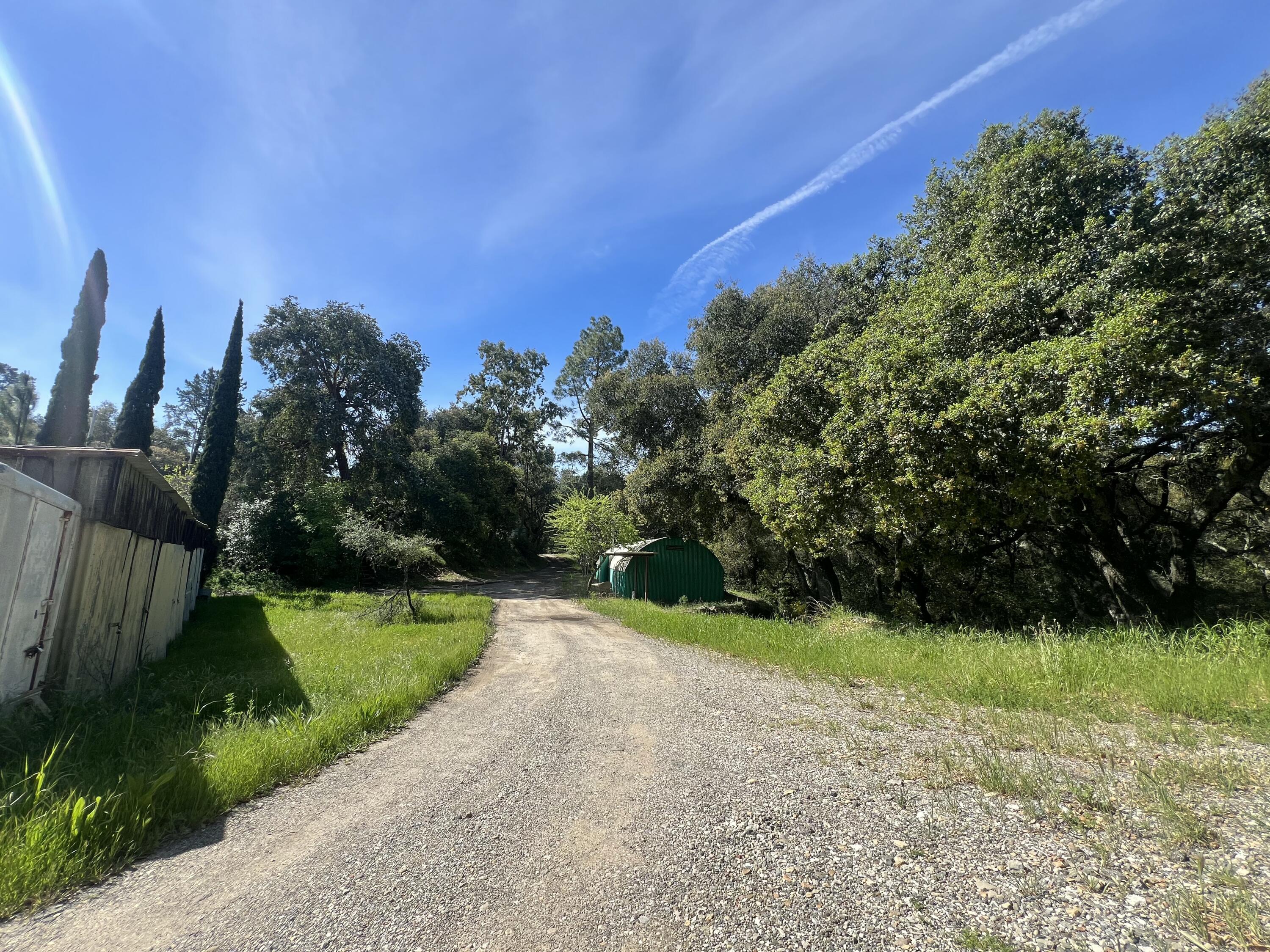 6572 Stagecoach Road Santa Barbara, CA 93105 - Photo 17 of 44 a view of a golf course with a yard
