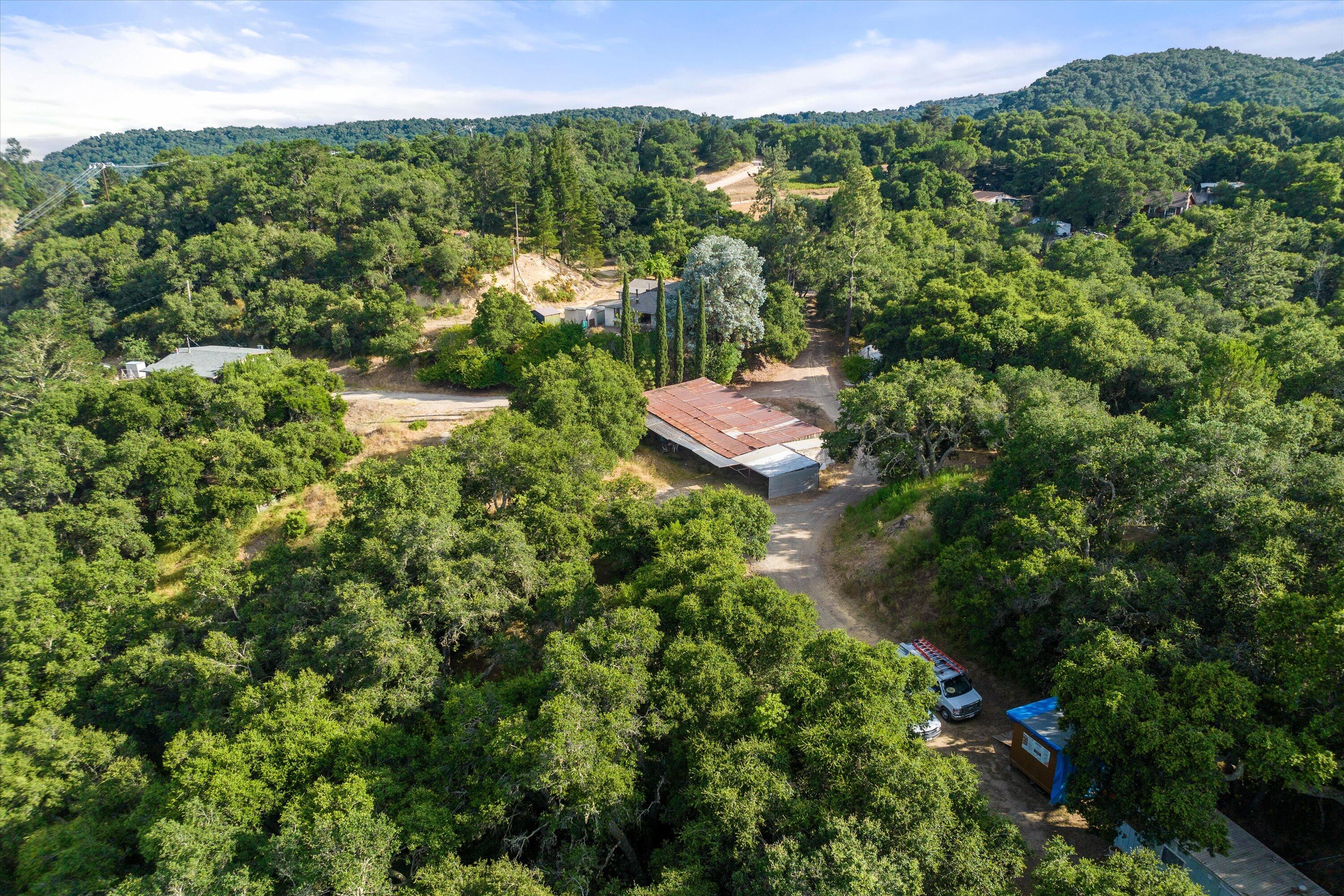 6572 Stagecoach Road Santa Barbara, CA 93105 - Photo 31 of 44 a view of a house with a lush green forest