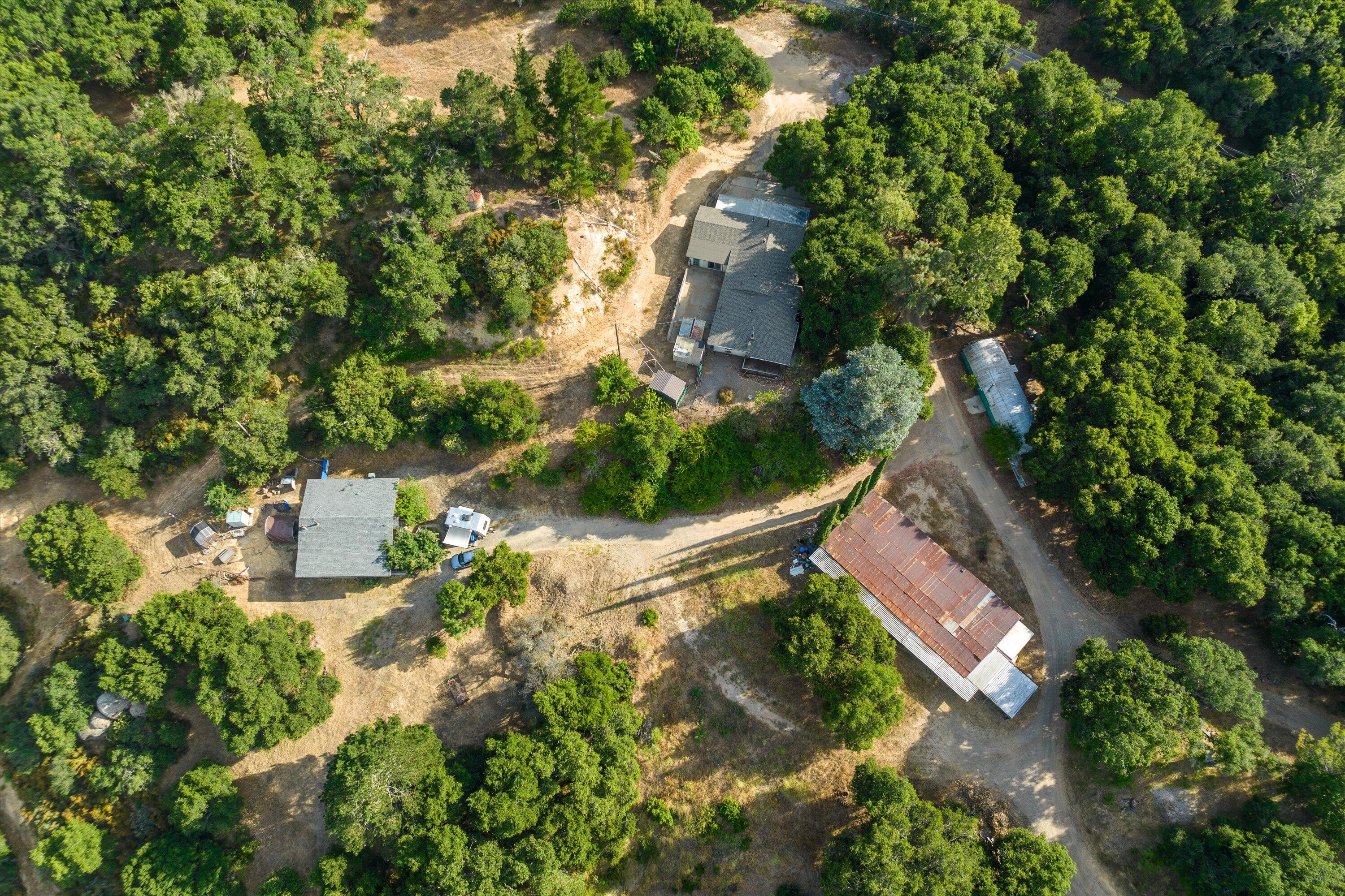 6572 Stagecoach Road Santa Barbara, CA 93105 - Photo 32 of 44 an aerial view of a house with a yard and trees