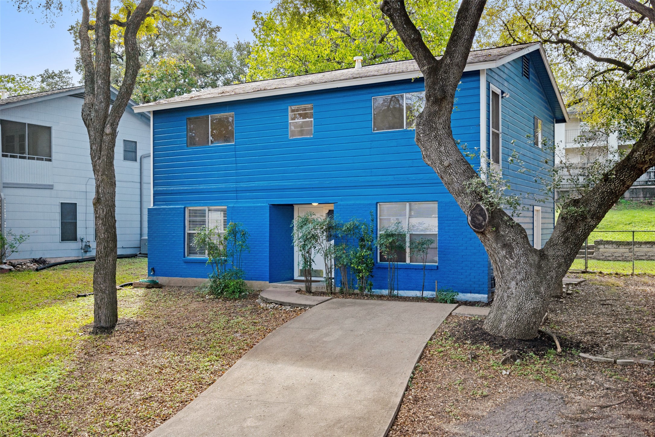 517 Lightsey Road Austin, TX 78704 - Photo 1 of 1 a front view of a house with garden