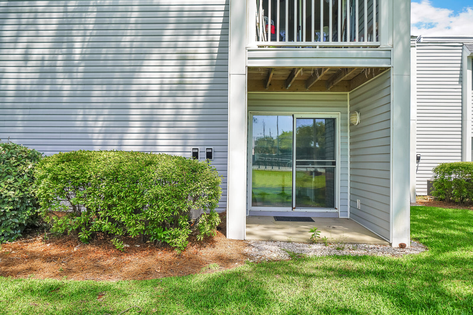 101 Old Ferry Road, Unit 5B Shalimar, FL 32579 - Photo 16 of 22 a view of a house with a yard