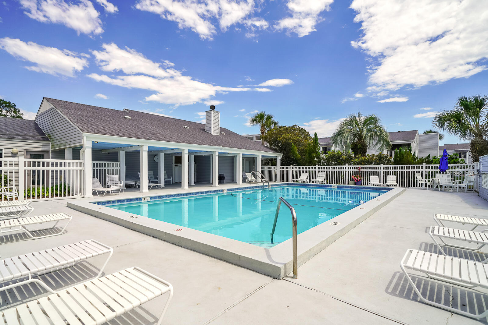 101 Old Ferry Road, Unit 5B Shalimar, FL 32579 - Photo 19 of 22 a view of a house with a swimming pool