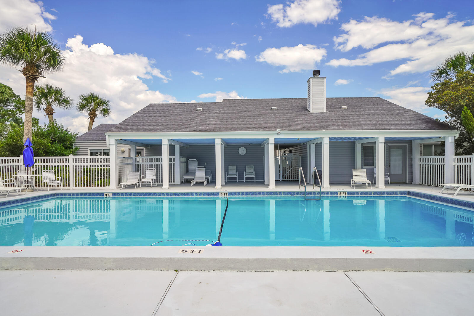 101 Old Ferry Road, Unit 5B Shalimar, FL 32579 - Photo 20 of 22 a front view of a house with a garden and lake view