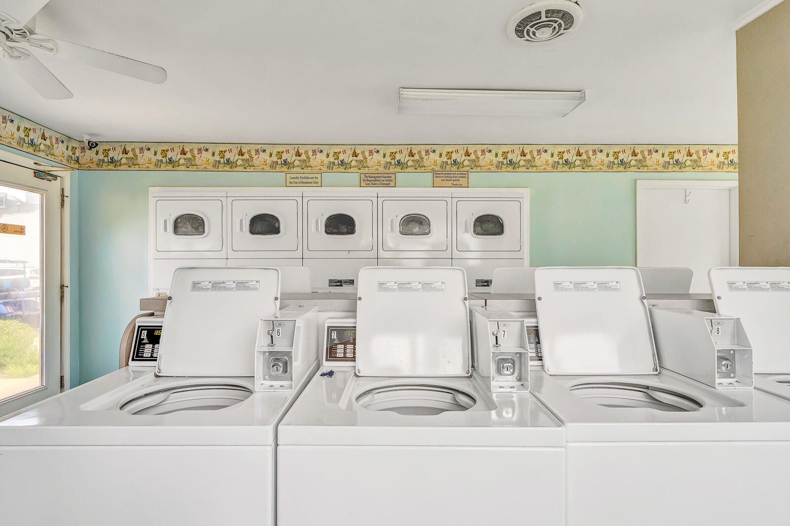 101 Old Ferry Road, Unit 5B Shalimar, FL 32579 - Photo 22 of 22 a white stove top oven sitting inside of a house