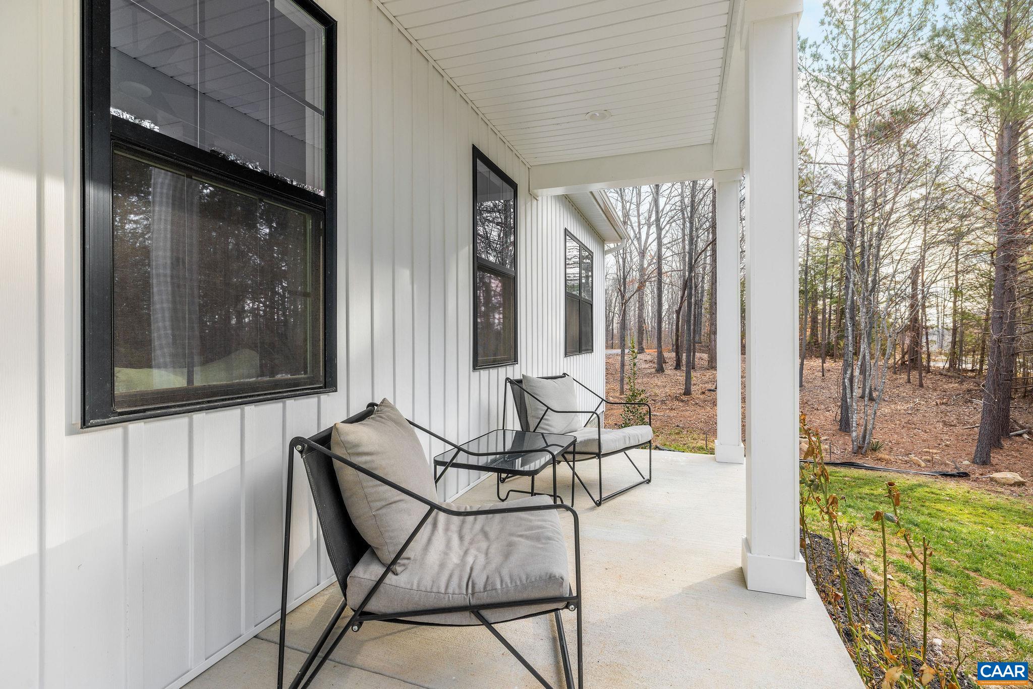 1229 Peach Grove Road Louisa, VA 23093 - Photo 3 of 47 a view of two chairs in the balcony