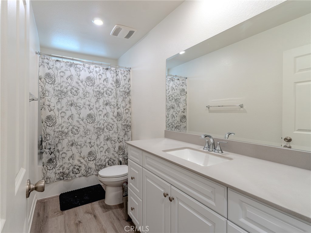 25602 Pne Rdg Road Homeland, CA 92548 - Photo 18 of 35 a bathroom with a sink toilet and shower