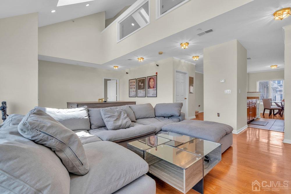 368 Rector Street, Unit 508 Perth Amboy, NJ 08861 - Photo 1 of 34 a living room with furniture and a wooden floor