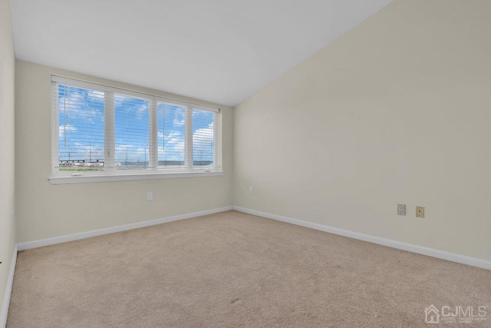368 Rector Street, Unit 508 Perth Amboy, NJ 08861 - Photo 12 of 34 an empty room with a window