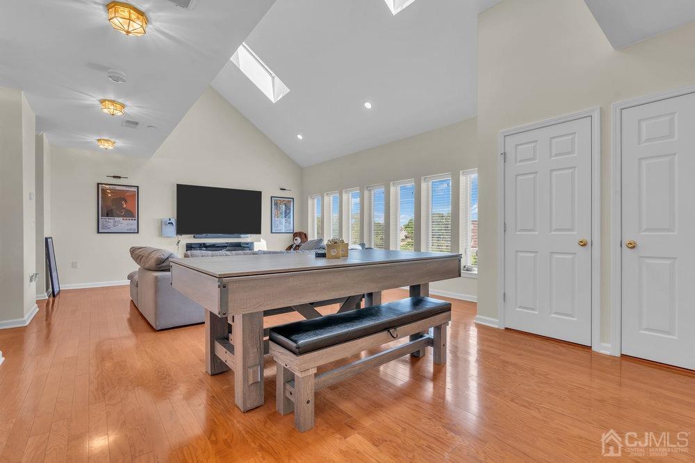 368 Rector Street, Unit 508 Perth Amboy, NJ 08861 - Photo 20 of 34 a living room with furniture flat screen tv and a fireplace