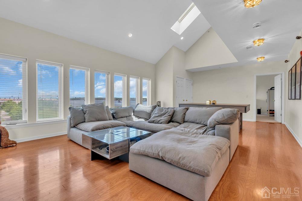 368 Rector Street, Unit 508 Perth Amboy, NJ 08861 - Photo 24 of 34 a living room with furniture and a large window