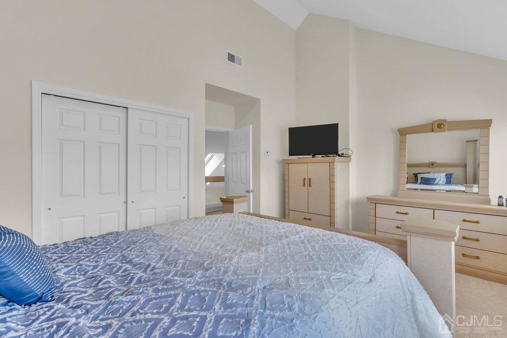 368 Rector Street, Unit 508 Perth Amboy, NJ 08861 - Photo 7 of 34 a bedroom with a bed and a flat screen tv