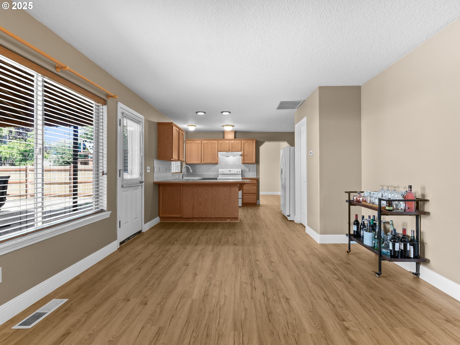52407 Northeast 14th Scappoose, OR 97056 - Photo 12 of 46 a view of kitchen with cabinets and wooden floor