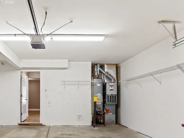 a view of storage and utility room with stairs
