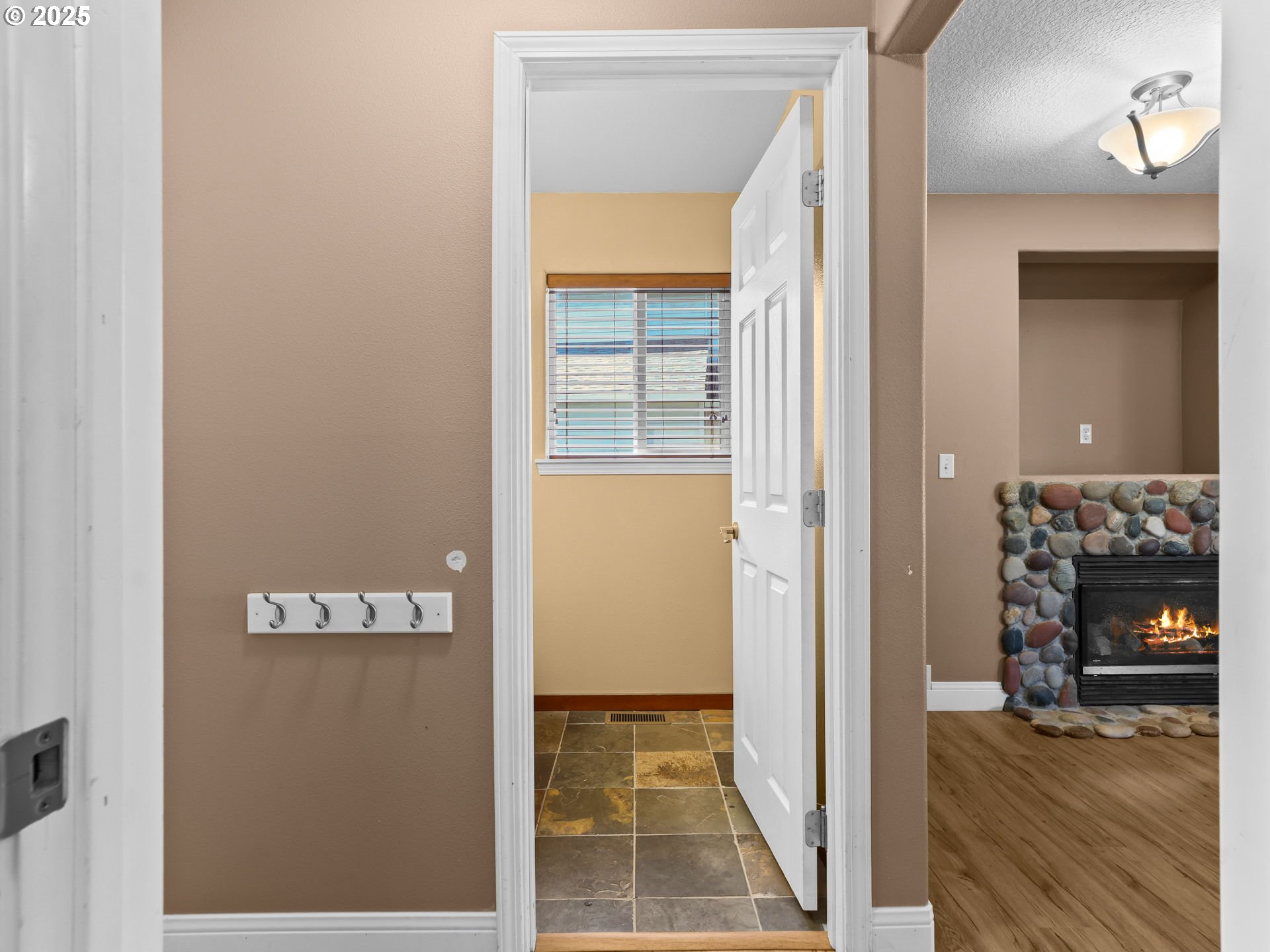 52407 Northeast 14th Scappoose, OR 97056 - Photo 16 of 46 a view of a livingroom from a hallway