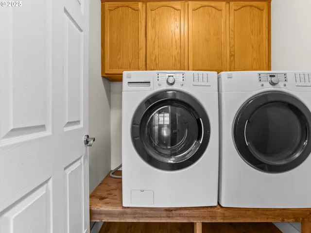 a utility room with dryer and washer