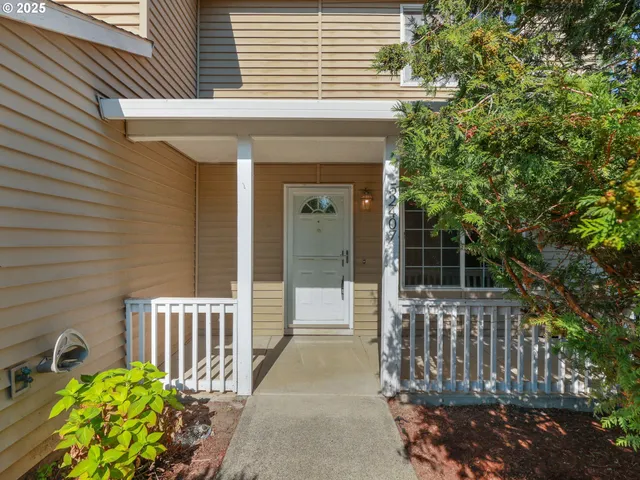 a front view of a house with a porch