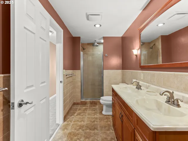 a view of a bathroom from a hallway