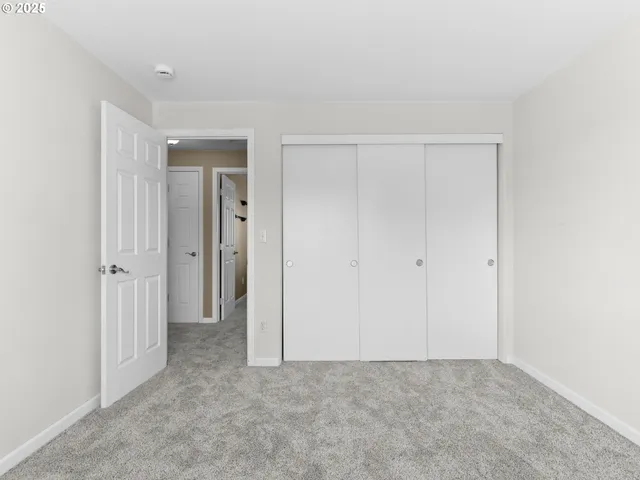 a view of a hallway with closet