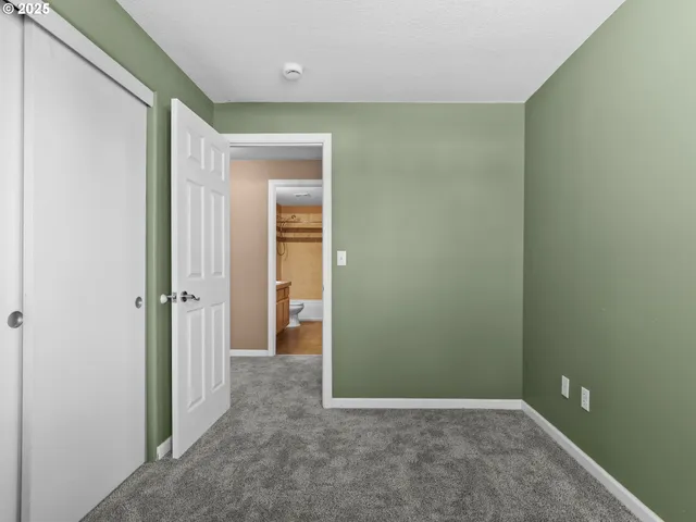 a view of a chairs and table on the wooden deck