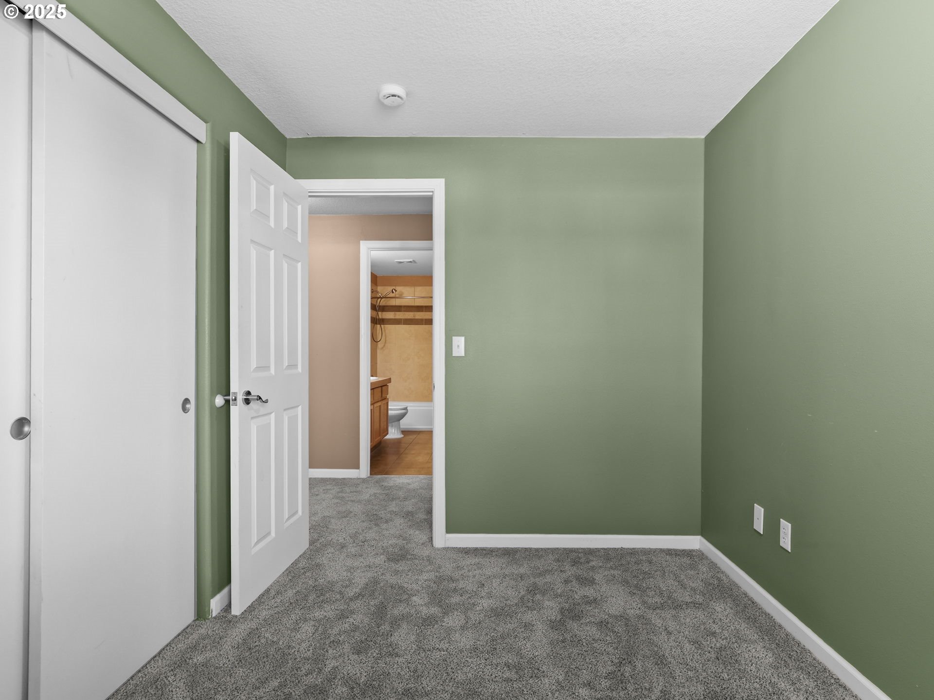 52407 Northeast 14th Scappoose, OR 97056 - Photo 39 of 46 an empty room with closet and a bathroom
