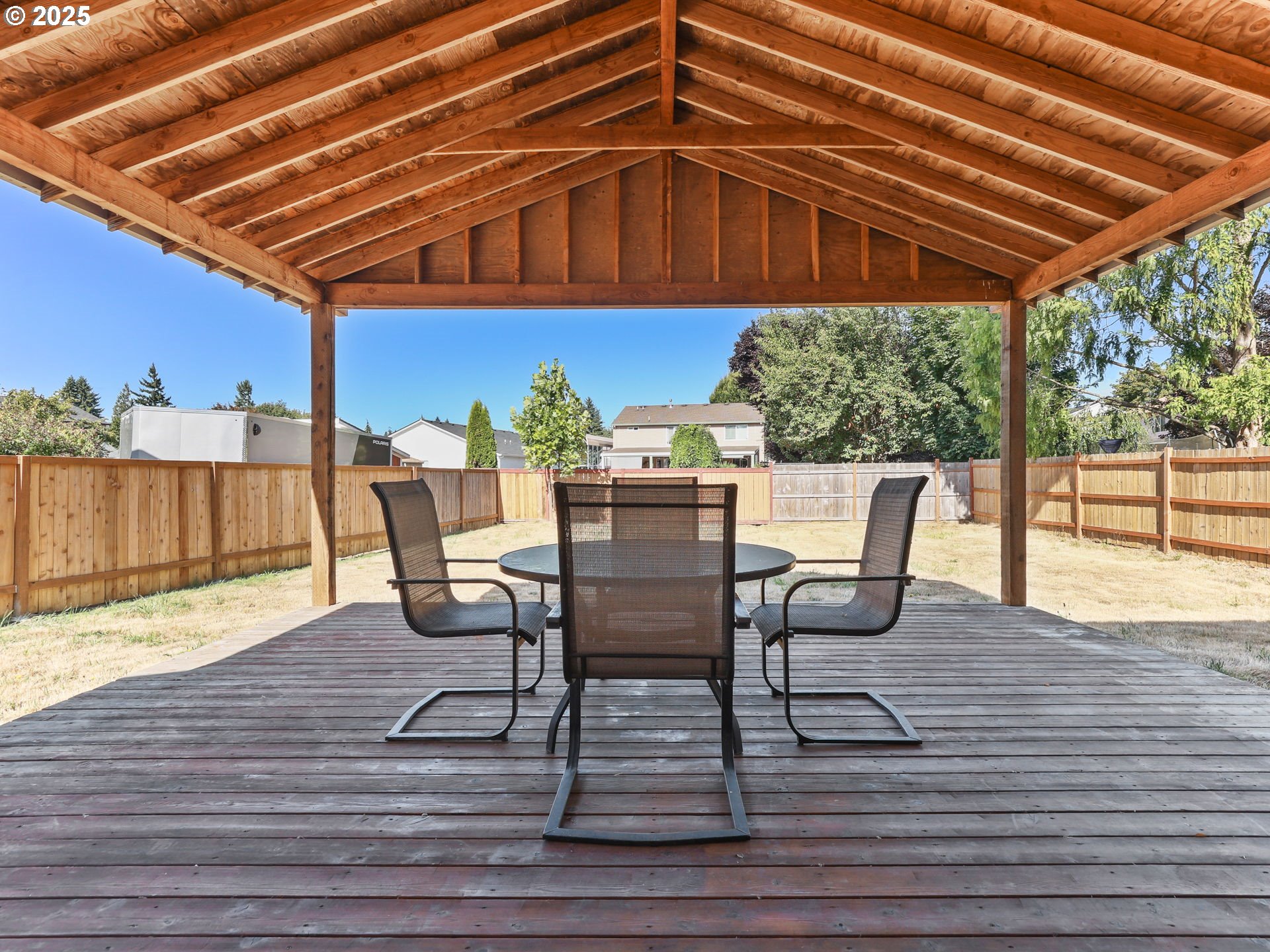 52407 Northeast 14th Scappoose, OR 97056 - Photo 40 of 46 a patio with wooden floors and outdoor seating