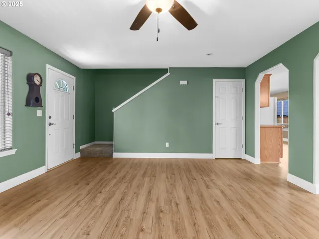 a view of a livingroom with wooden floor