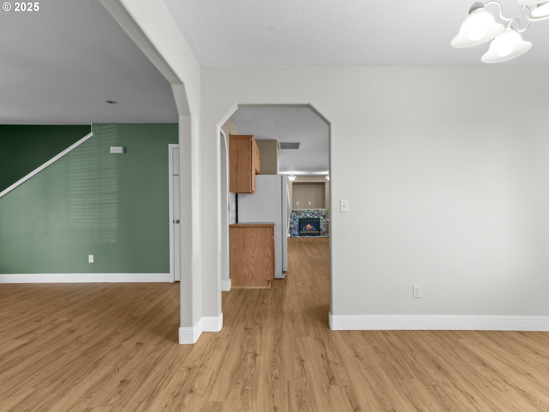 52407 Northeast 14th Scappoose, OR 97056 - Photo 8 of 46 a view of a room with wooden floor