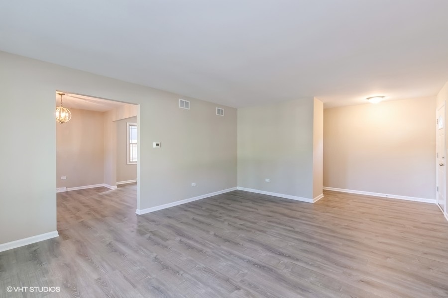 560 Linden Road Frankfort, IL 60423 - Photo 3 of 15 a view of an empty room with wooden floor