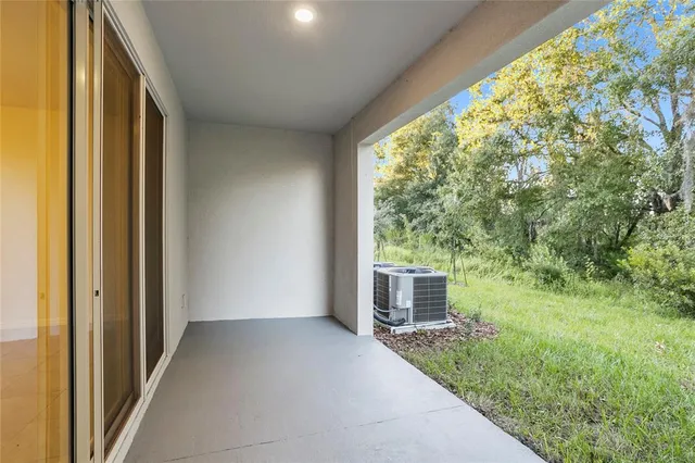 a view of a house with backyard and garden