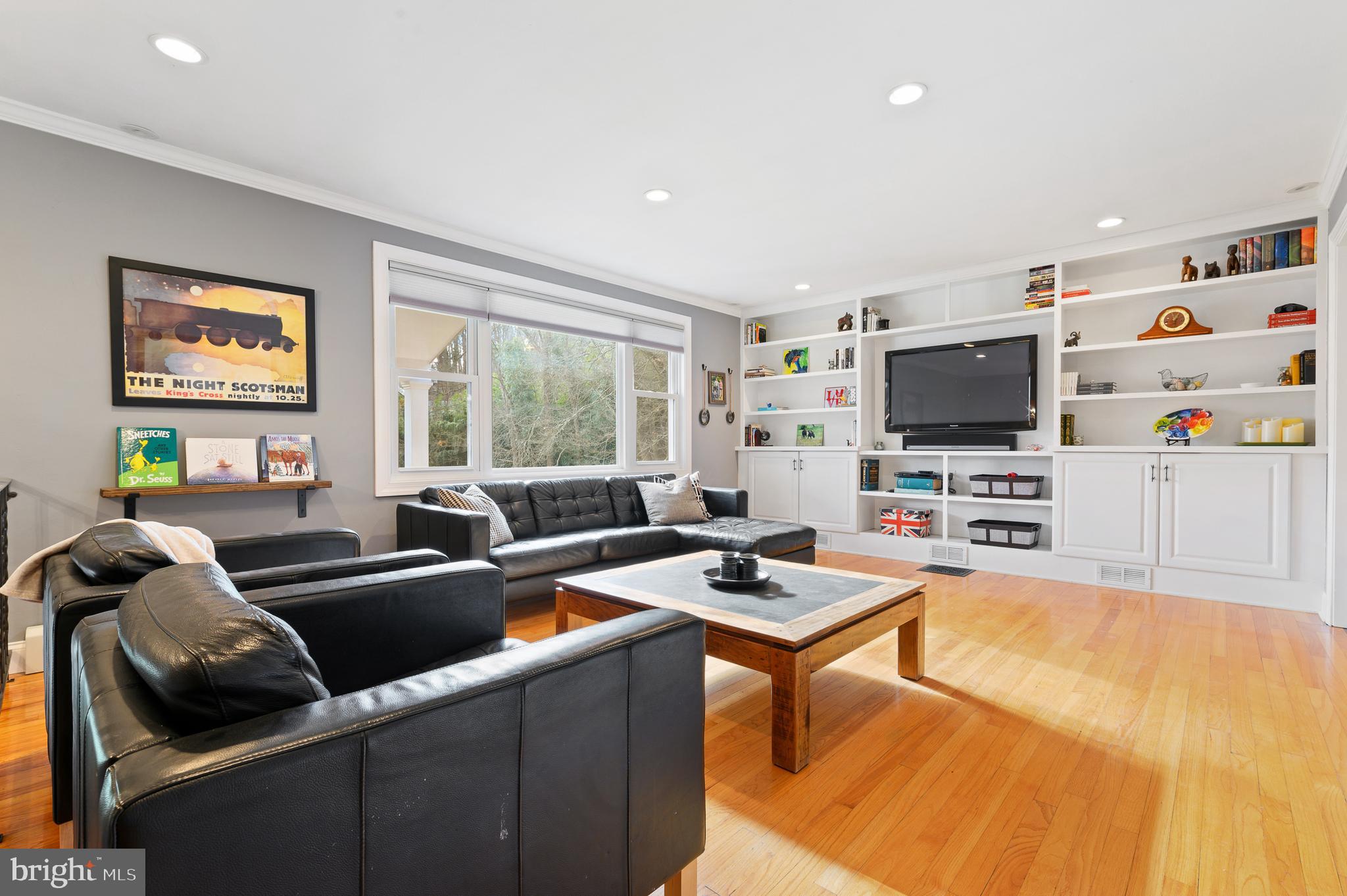 1973 Kimberton Road Phoenixville, PA 19460 - Photo 5 of 28 Sunny living room with custom built-ins
